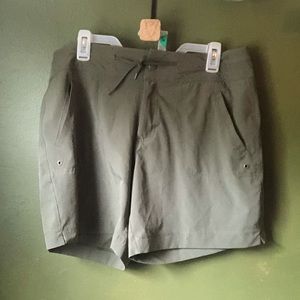 Olive green athletic material shorts